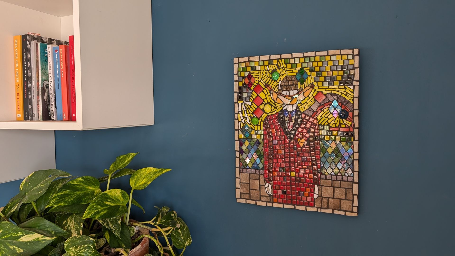 Mosaic on wall man with banana 