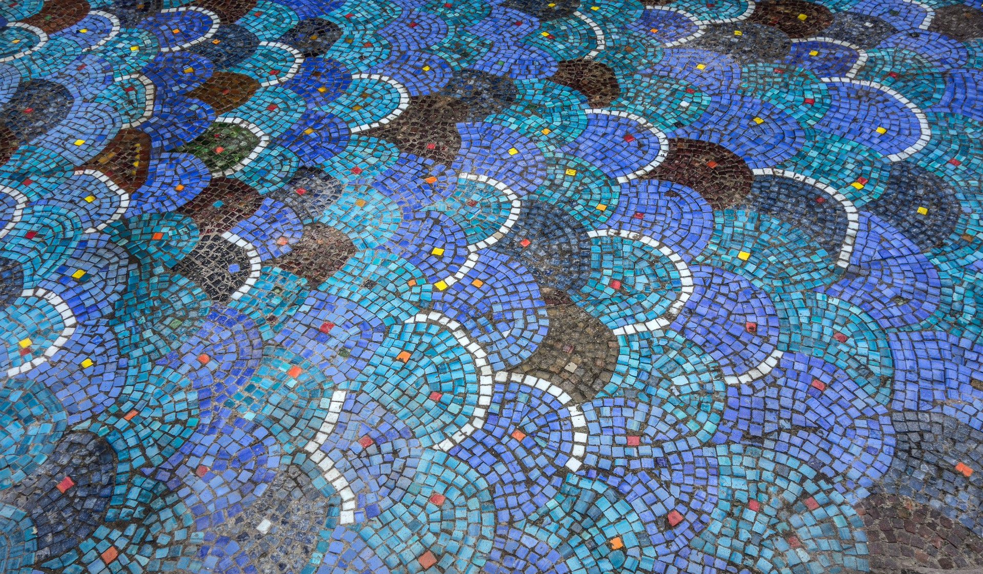 Pattern with texture of scales - mosaic art on fountain pond